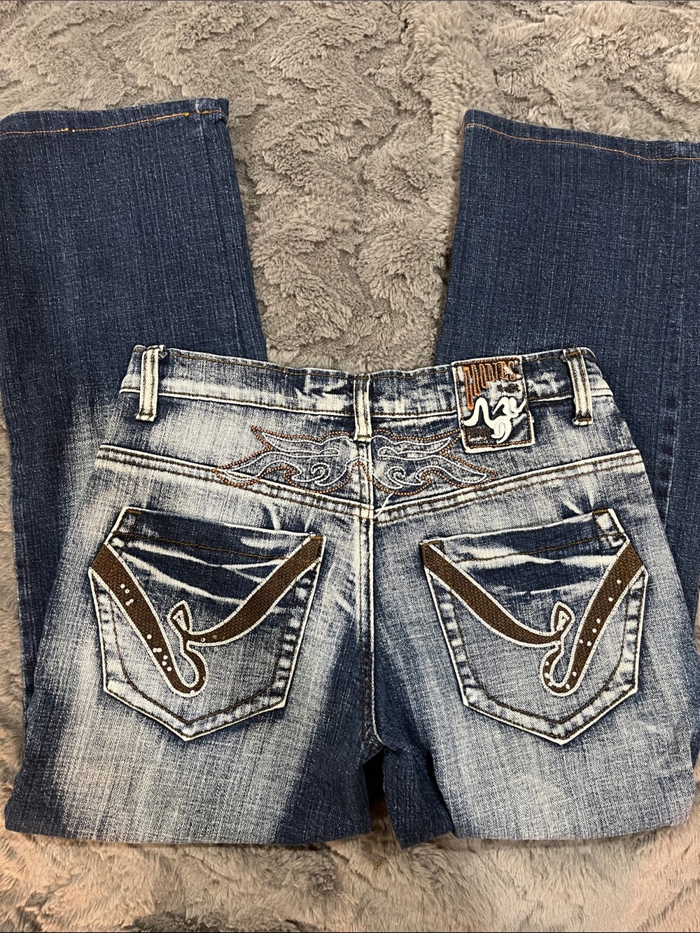 Women’s Flare & Wide Leg Jeans in Distressed Blue with Brown Accent